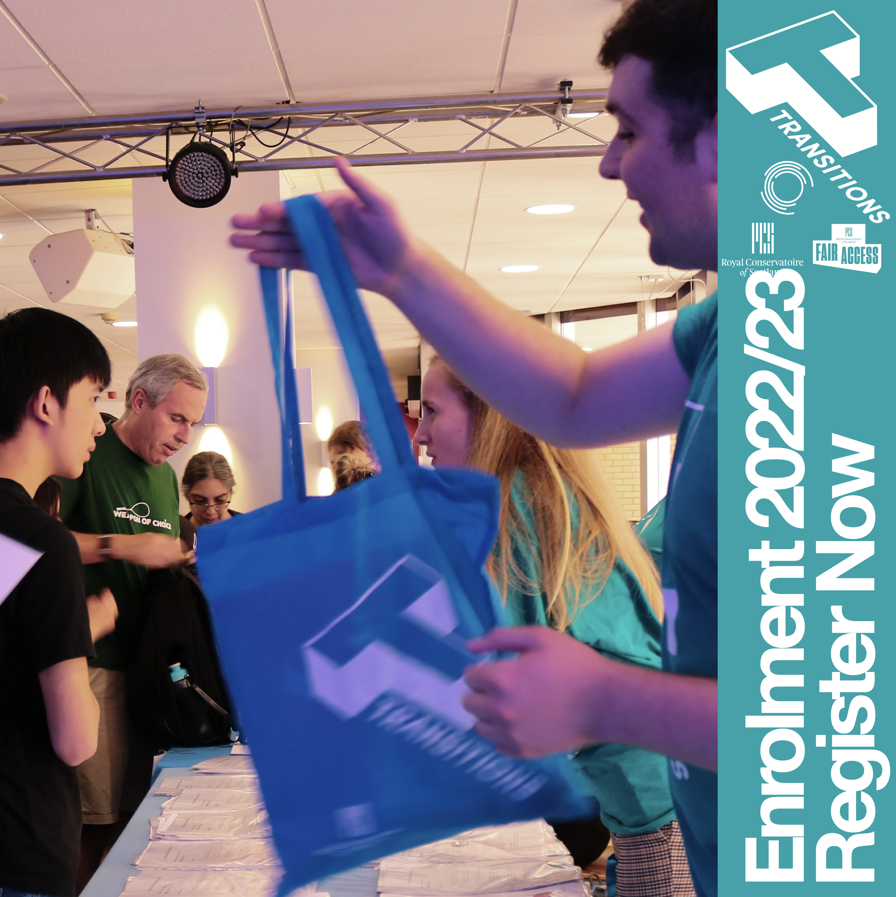 Staff member handing over a tote bag to unseen student