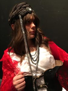 Young woman wearing a costume